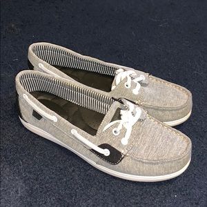 Grey and black sperrys